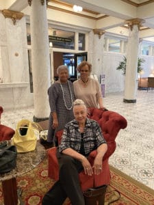 FORMER CLASSMATES OF the Merrill High School class of 1962, Chicago Crusader Publisher Dorothy R. Leavell and Mayme Jackson of Sherwood, Arkansas posed beside their teacher Dr. Margaret Louise Sirman Clark. (Photo by Andrew Leavell