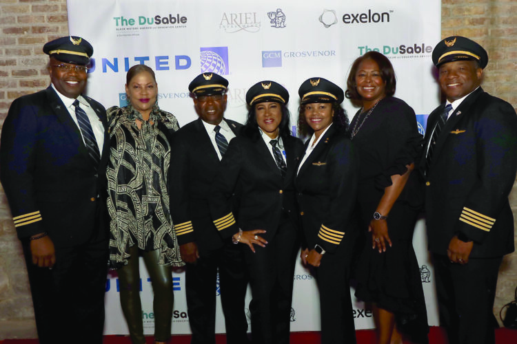 UNITED AIRLINES CAPTAIN Carole Hopson and other UnitedAirlines pilots.