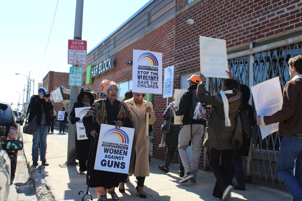 HELEN SINCLAIR PROTESTING CHUCKs GUN SHOP MARCH 18 2018 MARCHING AT CHUCKs GUNSHOP